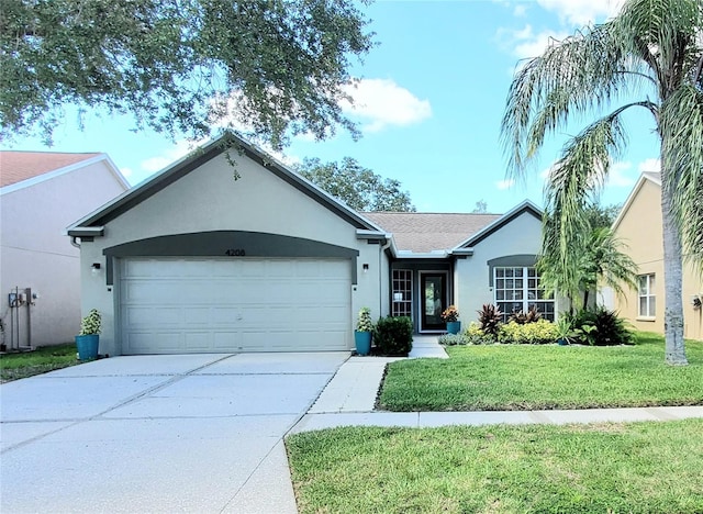 ranch-style house with a garage and a front yard