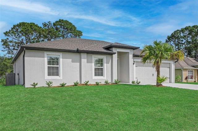 ranch-style home featuring a garage and a front yard