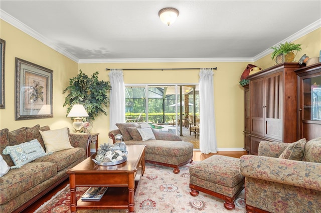 living room with hardwood / wood-style flooring and ornamental molding