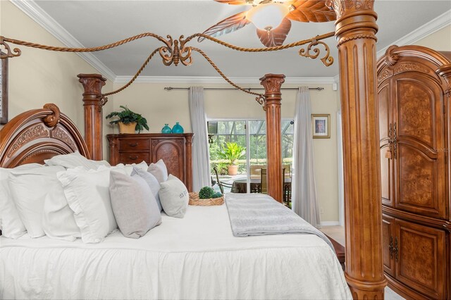 bedroom featuring access to exterior, ceiling fan, and ornamental molding