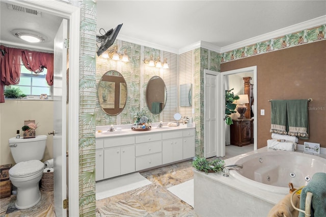 bathroom with tiled tub, crown molding, vanity, and toilet