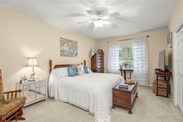 carpeted bedroom featuring ceiling fan