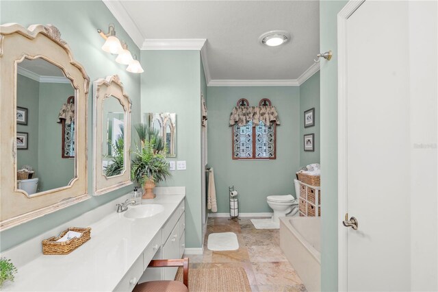 bathroom featuring crown molding, a washtub, vanity, and toilet