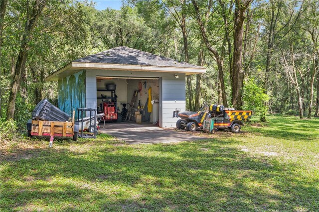 view of outdoor structure with a yard