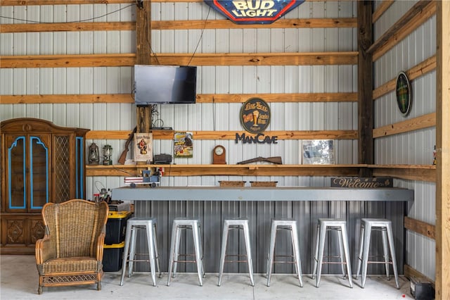 interior space featuring wooden walls