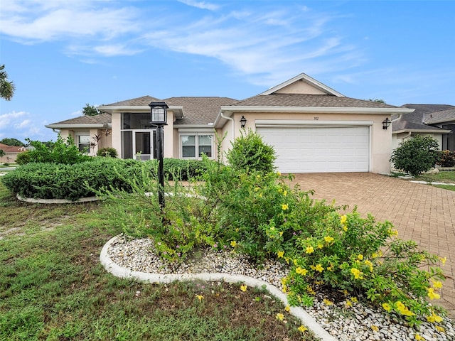 view of front of property with a garage