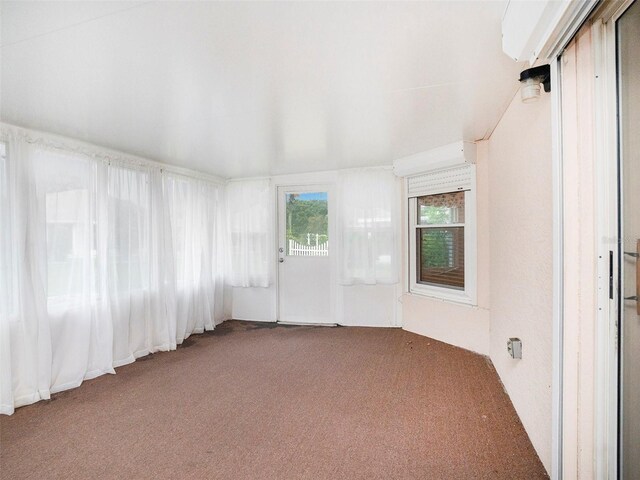 spare room featuring carpet floors