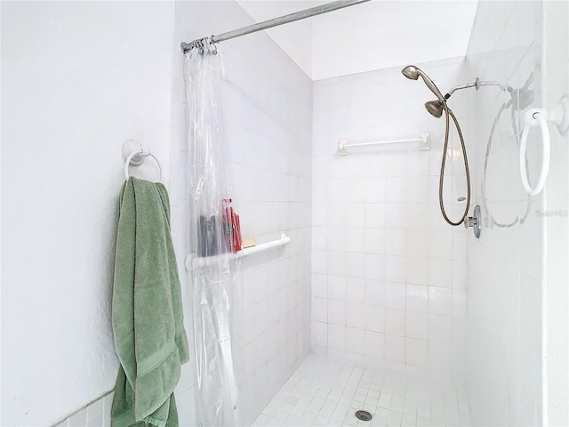 bathroom with a stall shower