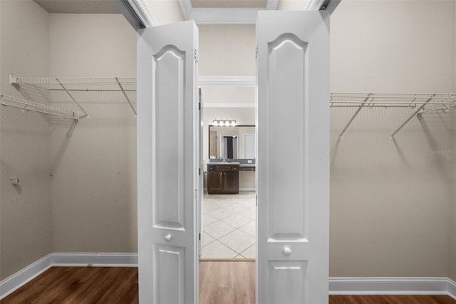 spacious closet with wood-type flooring