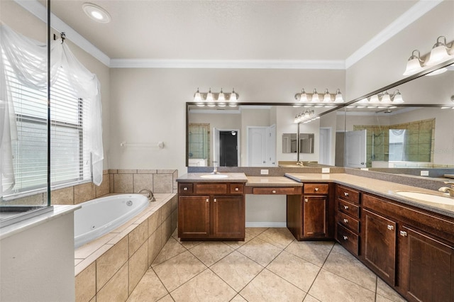 bathroom featuring double vanity, tiled tub, tile patterned floors, and crown molding