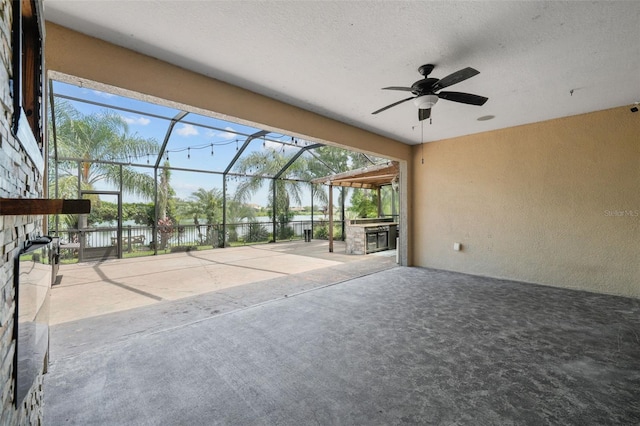 exterior space with a lanai and ceiling fan