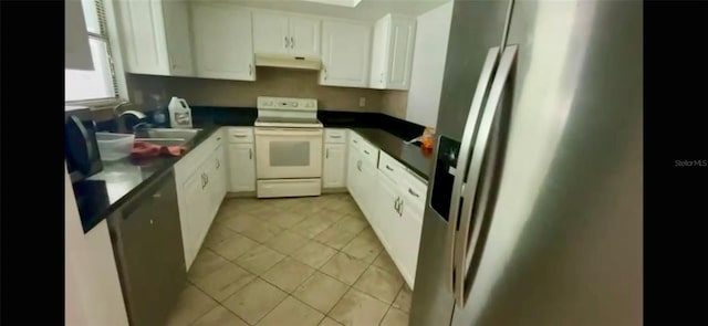 kitchen with sink, stainless steel appliances, and white cabinets