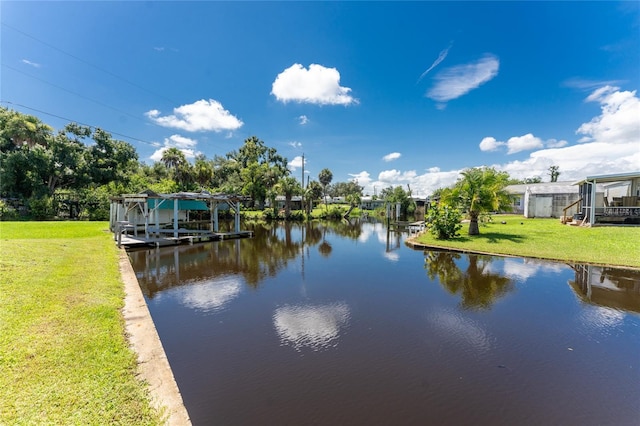 property view of water with a dock