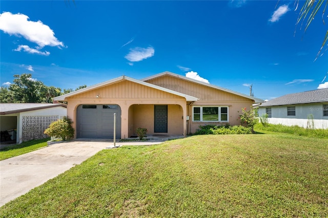 ranch-style home with a garage and a front yard