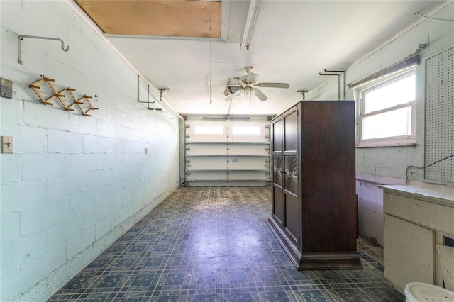 garage featuring ceiling fan