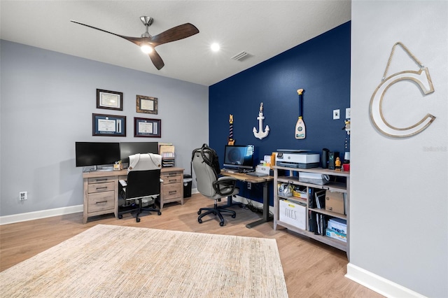 office area with ceiling fan and light hardwood / wood-style floors