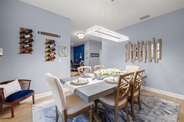 dining room featuring light wood-type flooring