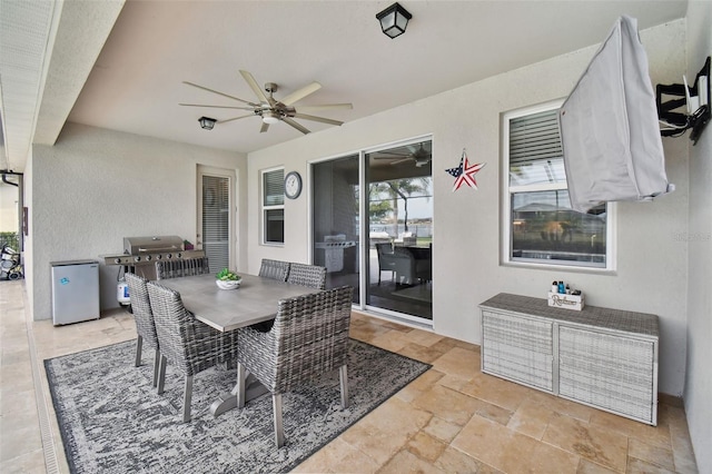 interior space featuring ceiling fan