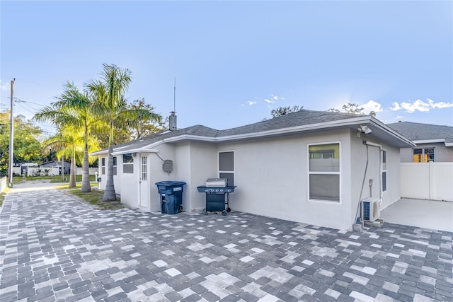 rear view of house featuring a patio