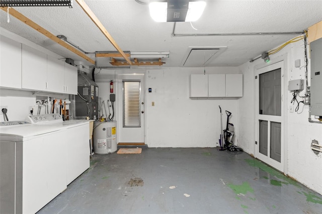 interior space with heating unit, electric water heater, and independent washer and dryer