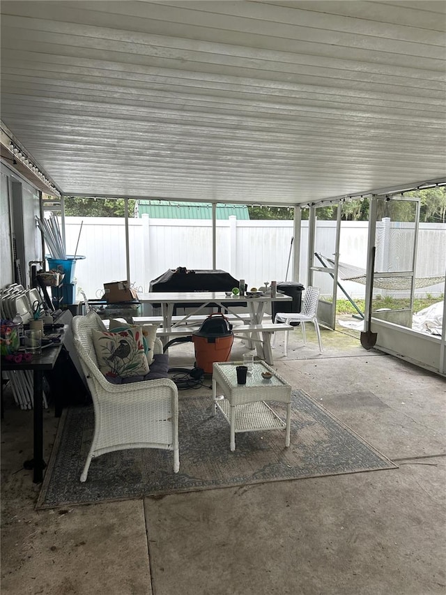 sunroom / solarium featuring a wealth of natural light