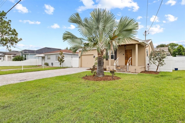 view of front facade featuring an attached garage, fence, decorative driveway, stucco siding, and a front lawn