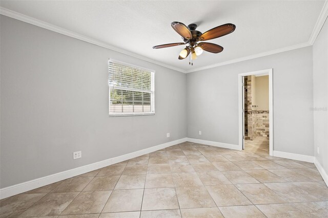 unfurnished room featuring crown molding, ceiling fan, baseboards, and light tile patterned floors