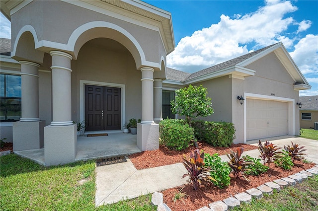 property entrance featuring a garage, driveway, roof with shingles, a porch, and stucco siding