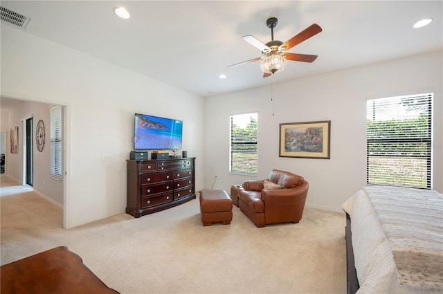 bedroom featuring light colored carpet, visible vents, and recessed lighting