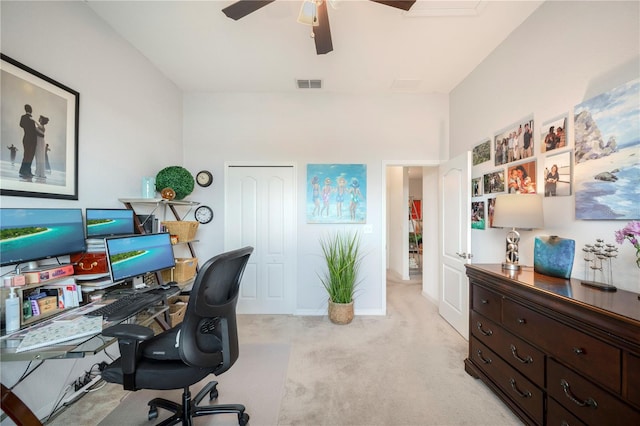 office featuring ceiling fan and light colored carpet