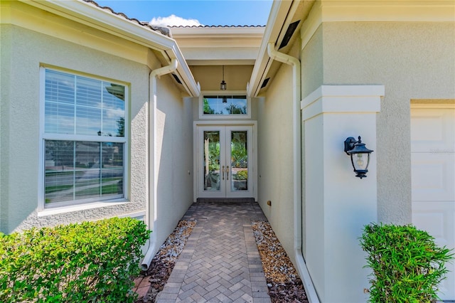 entrance to property featuring french doors