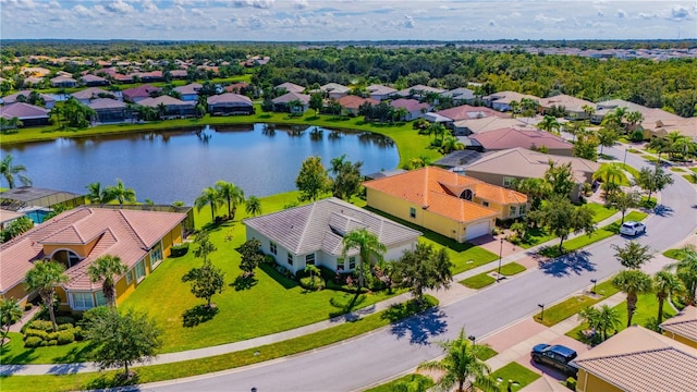 drone / aerial view with a water view