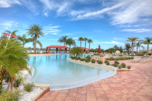 view of pool with a patio and a gazebo