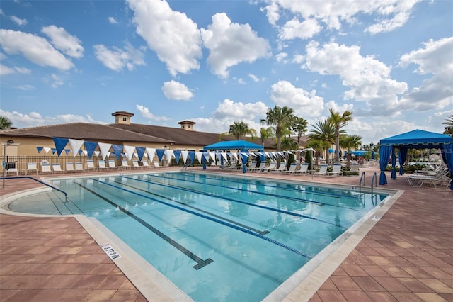 view of swimming pool featuring a gazebo