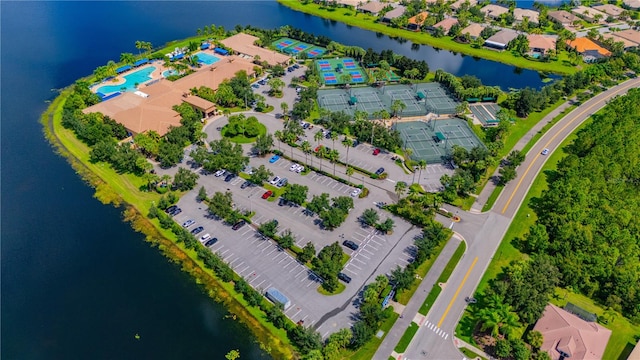 birds eye view of property featuring a water view