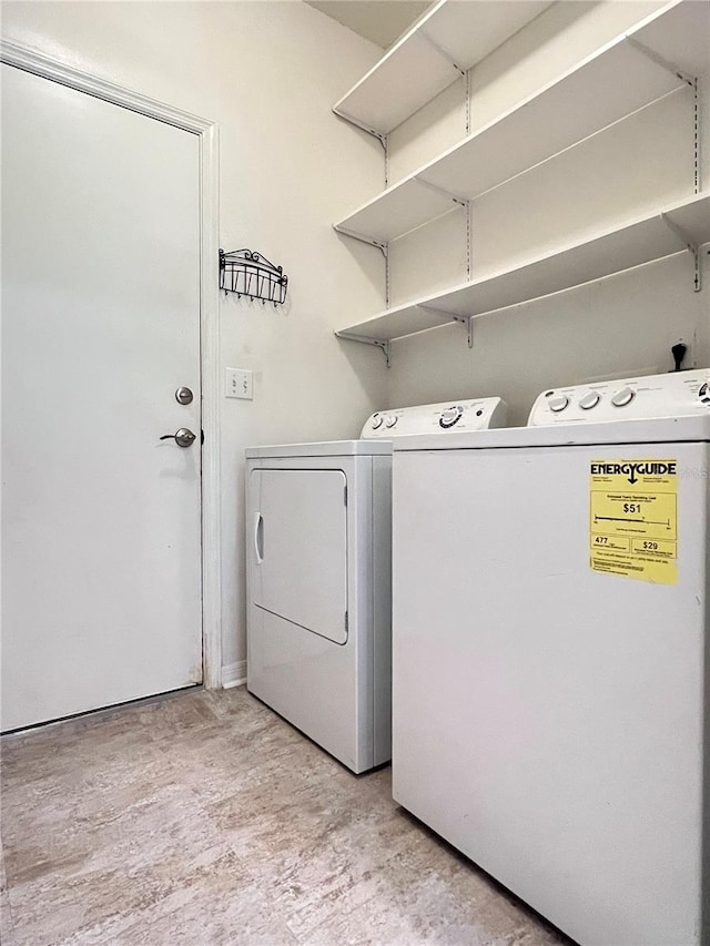 laundry room with independent washer and dryer