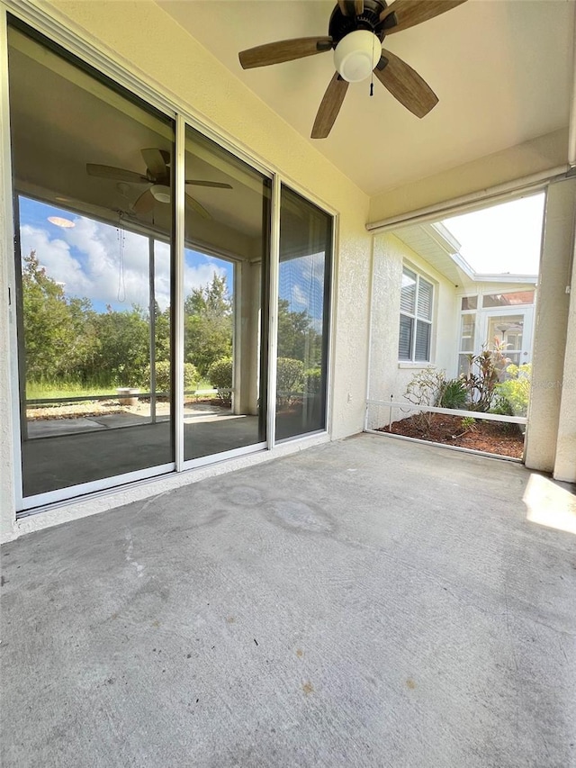 view of patio / terrace featuring ceiling fan