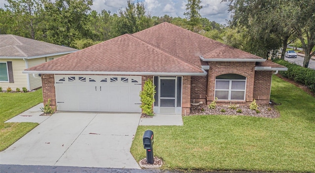 ranch-style house featuring a front yard and a garage