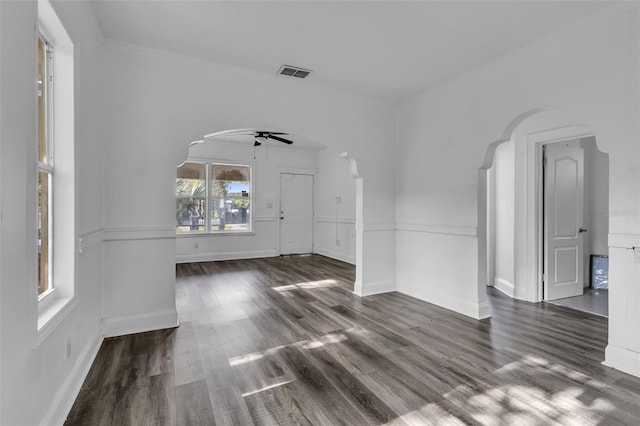 interior space featuring dark hardwood / wood-style flooring and ceiling fan