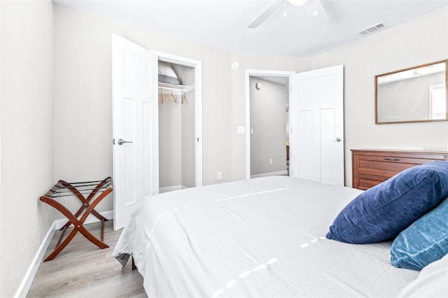 bedroom featuring light hardwood / wood-style flooring and ceiling fan