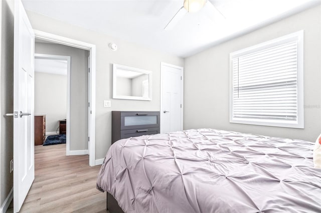 bedroom featuring ceiling fan and light wood-type flooring