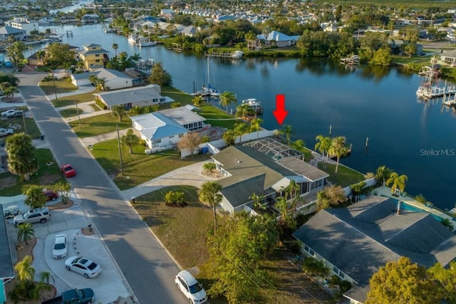 drone / aerial view featuring a water view