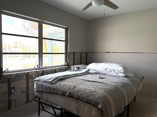 bedroom featuring ceiling fan