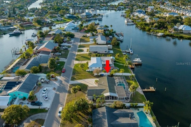 drone / aerial view featuring a water view