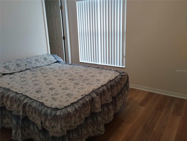 bedroom featuring hardwood / wood-style floors