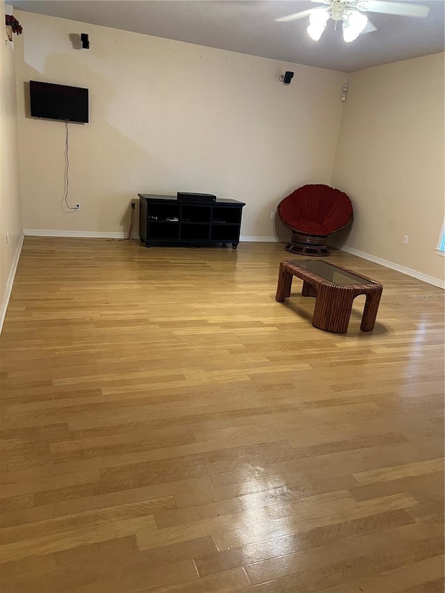 unfurnished room featuring ceiling fan and light hardwood / wood-style flooring