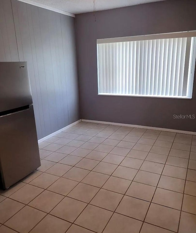 interior space featuring light tile patterned flooring