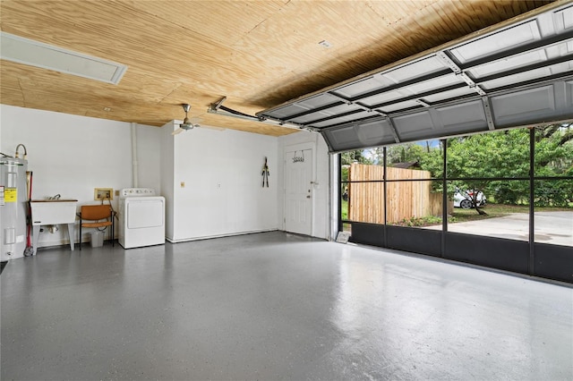 garage with sink, washer / dryer, water heater, and wood ceiling