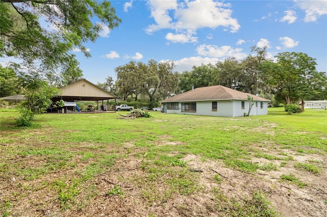 view of yard featuring a carport