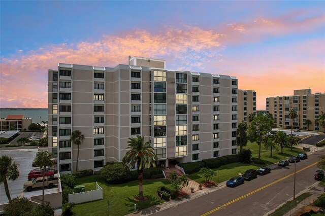 view of outdoor building at dusk